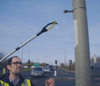 a man conducting an air quality test outside