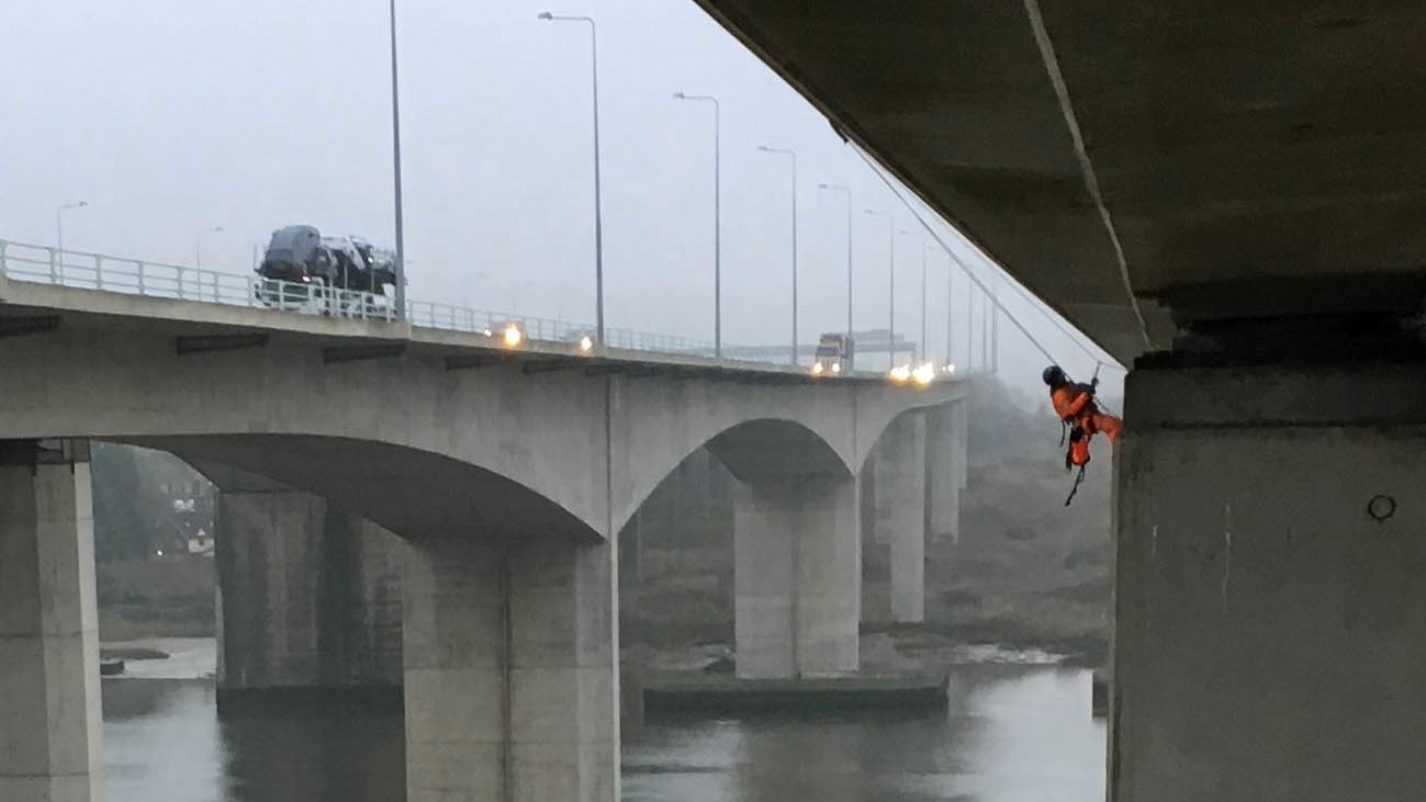 Inspecting A Highways Bridge